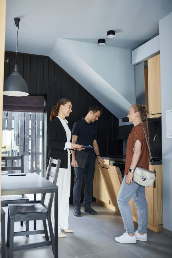 image of a family looking at a new home