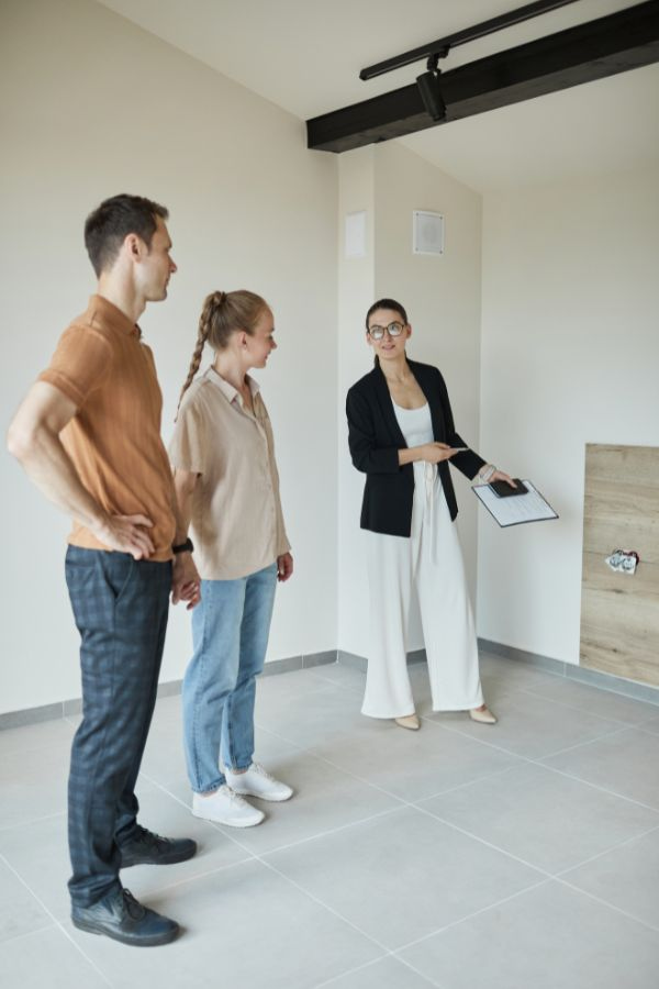 image of a couple getting a house tour